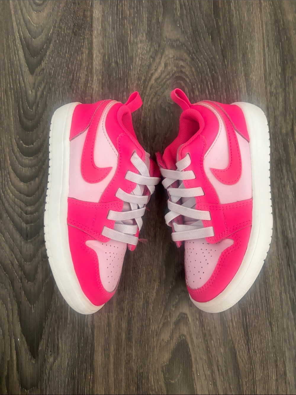 Jordan 1s Nike Kids Pink and Coral Low-Top Sneakers